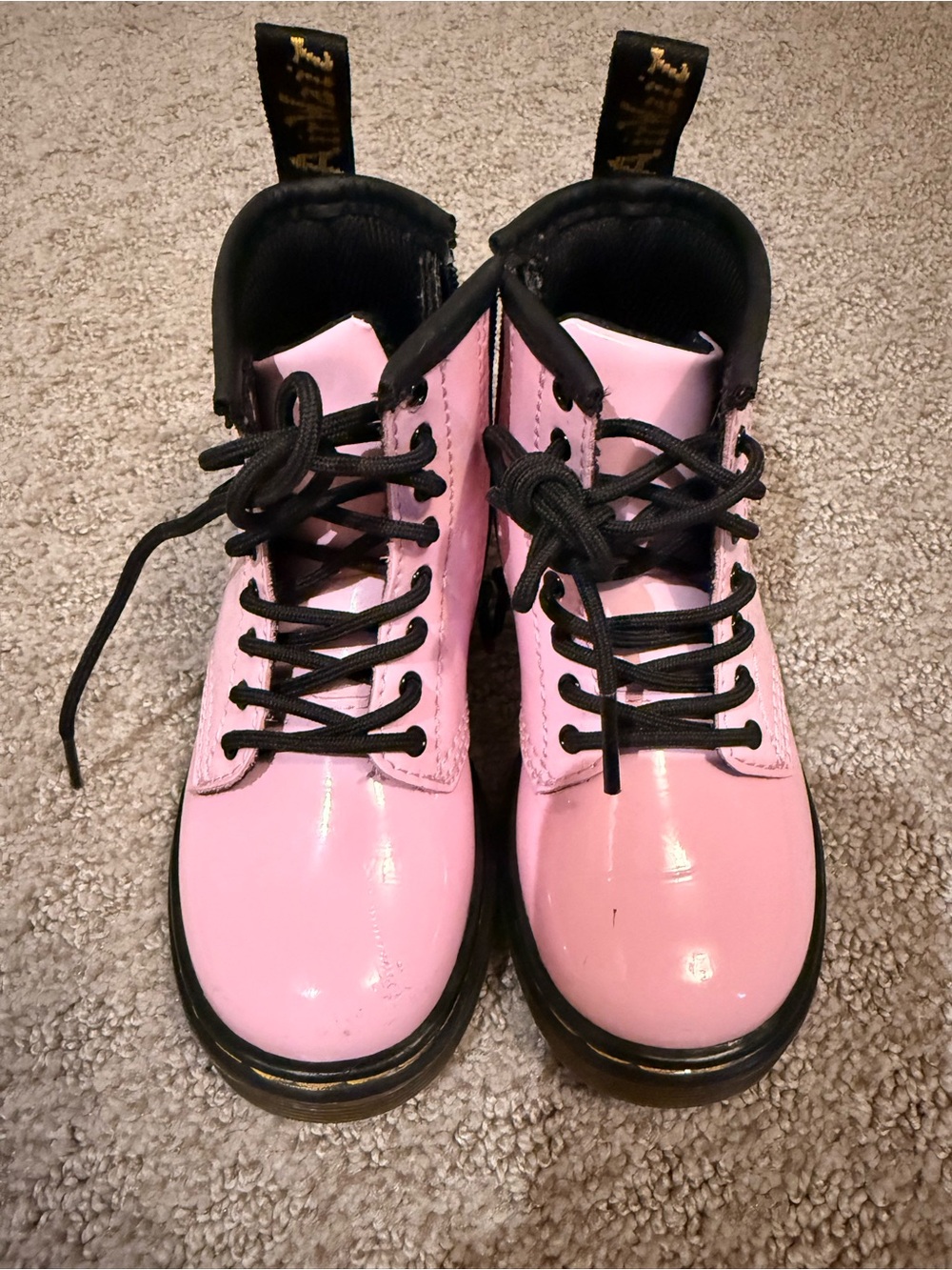 Dr. Martens Pink Patent Combat Boots with Black Trim